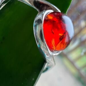 Hallmarked 925 beautiful color ember ring size 9 .See pictures for more details.